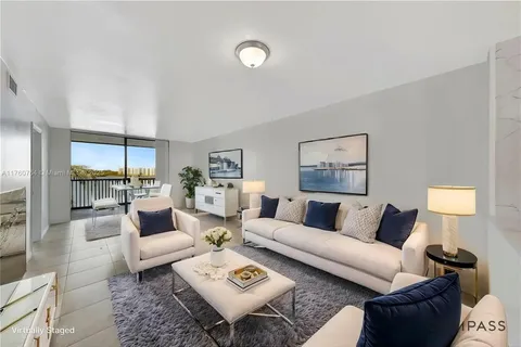 a view of a room with a large window