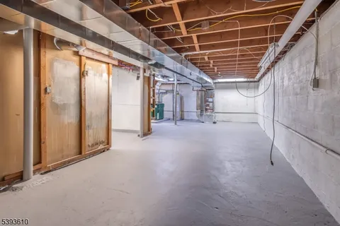 a view of a room with wooden walls