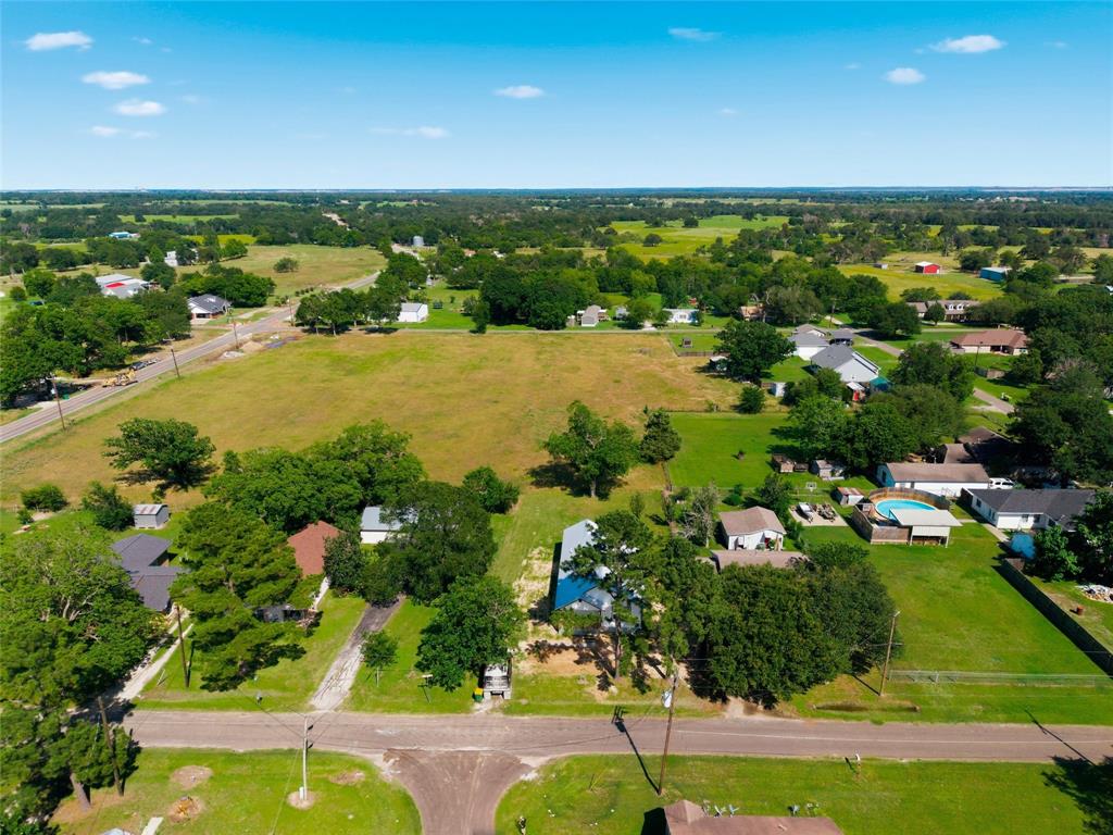 2023 Bosque Boulevard Waco, TX 76707 - Photo 23 of 26 Expansive land parcel featuring a verdant landscape and scattered mature trees