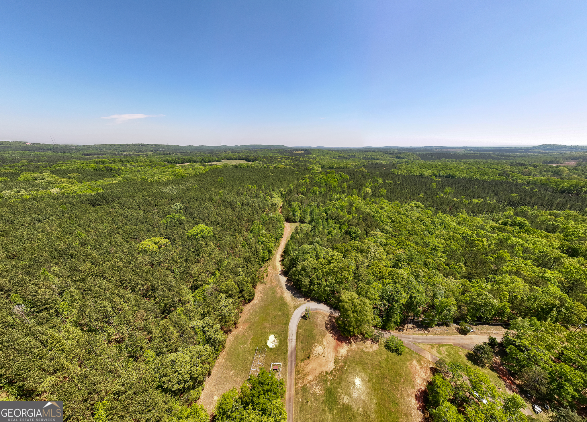 324-acres Hunsinger Road Shiloh, GA 31826 - Photo 20 of 62 a view of a lake with a city