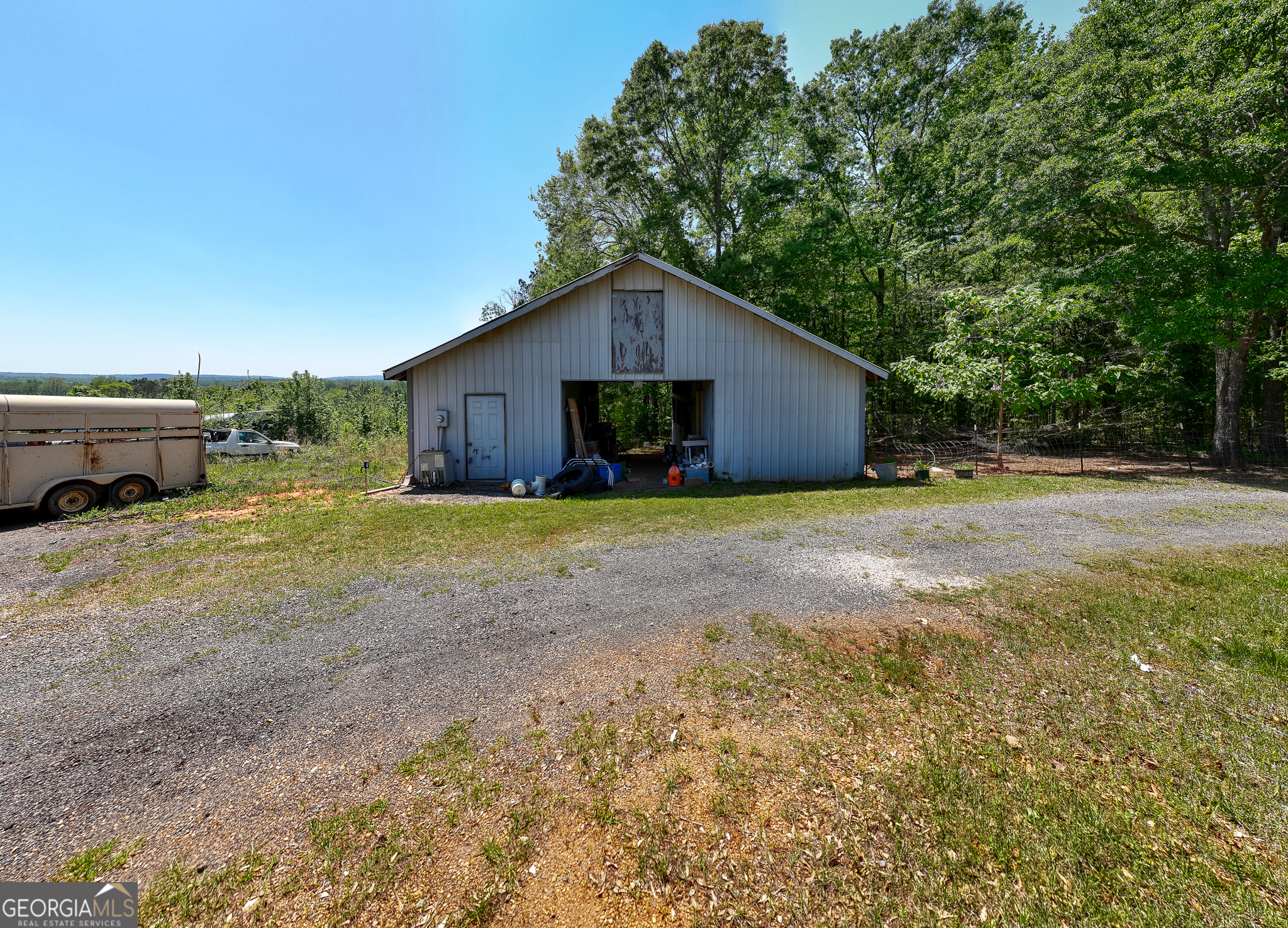 324-acres Hunsinger Road Shiloh, GA 31826 - Photo 39 of 62 a view of a house with a yard