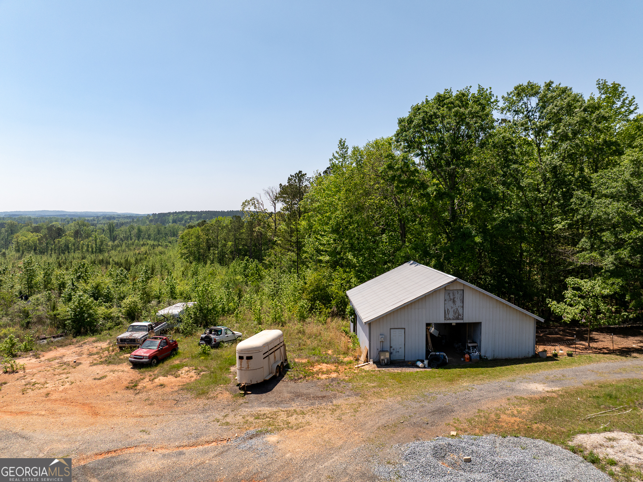 324-acres Hunsinger Road Shiloh, GA 31826 - Photo 42 of 62 a view of a house with yard and sitting area