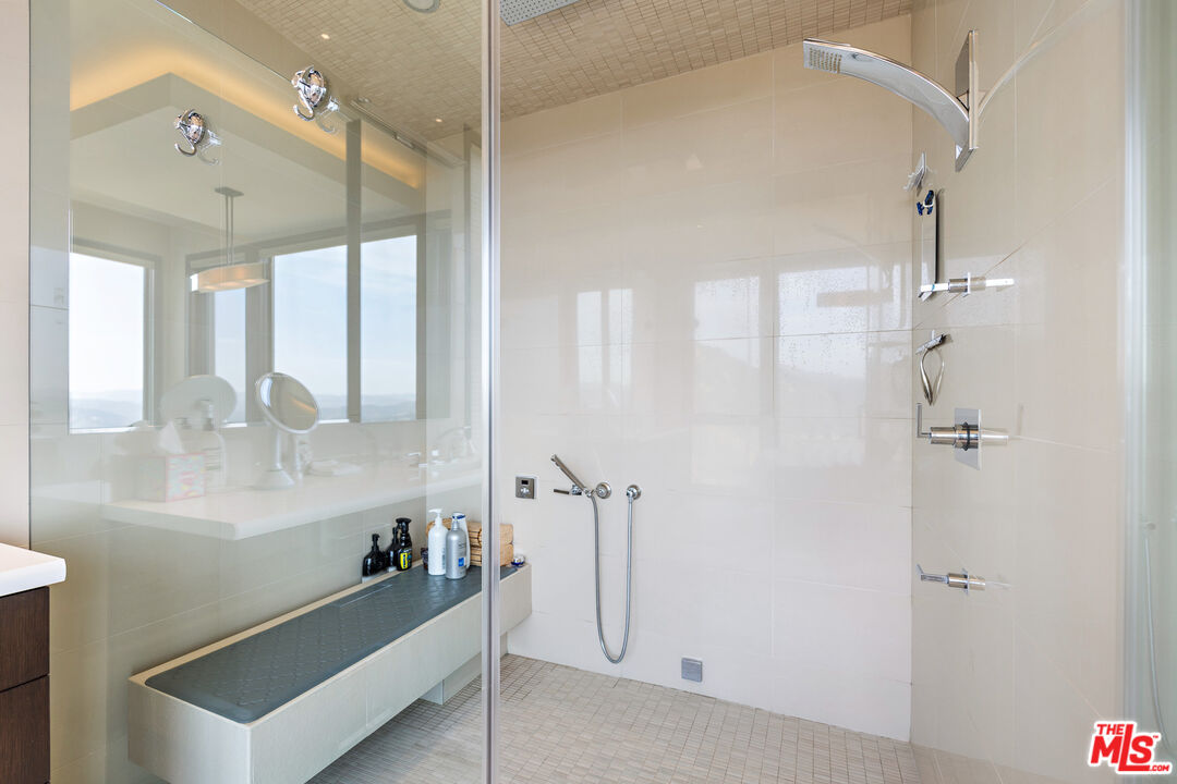 25155 Piuma Road Malibu, CA 90265 - Photo 16 of 29 a bathroom with a bathtub and a shower