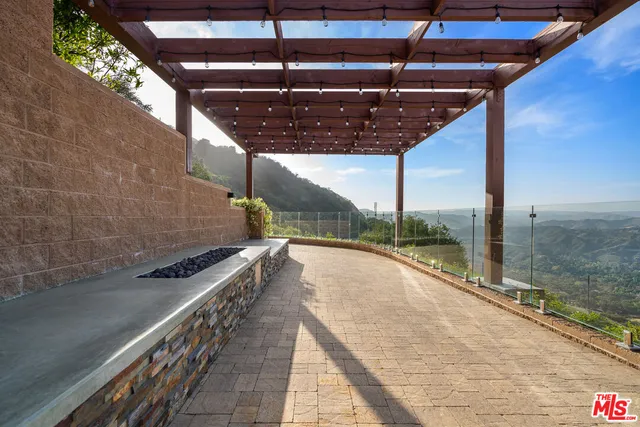 a building outdoor space with patio and furniture