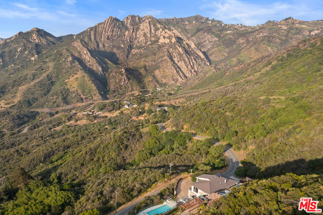 25155 Piuma Road Malibu, CA 90265 - Photo 28 of 29 a view of a dry yard with mountains in the background