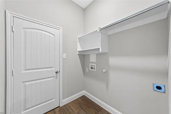 a view of small space with racks on the wall