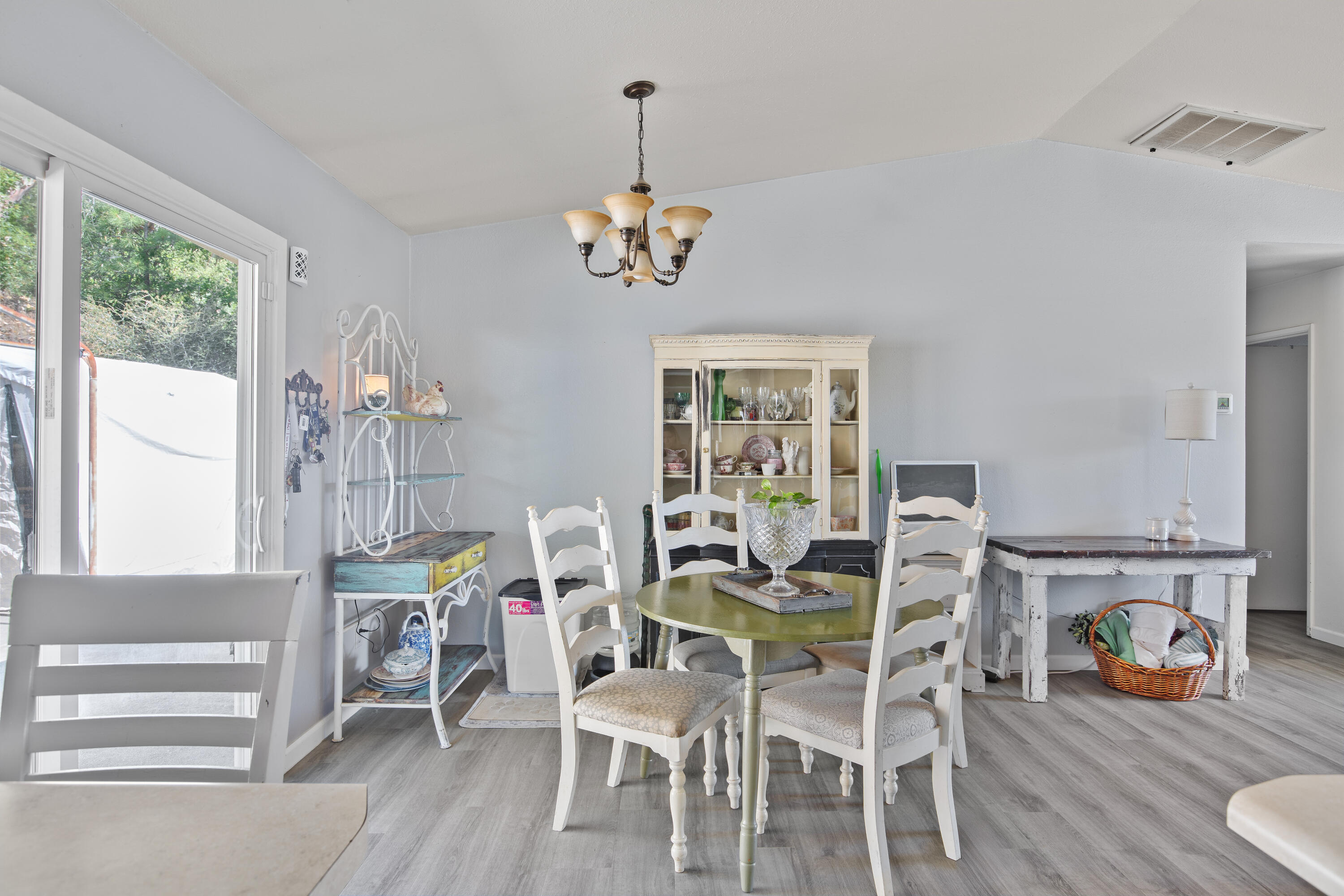 12748 Water Gap Road Williams, OR 97544 - Photo 8 of 35 a view of a dining room with furniture window and outside view