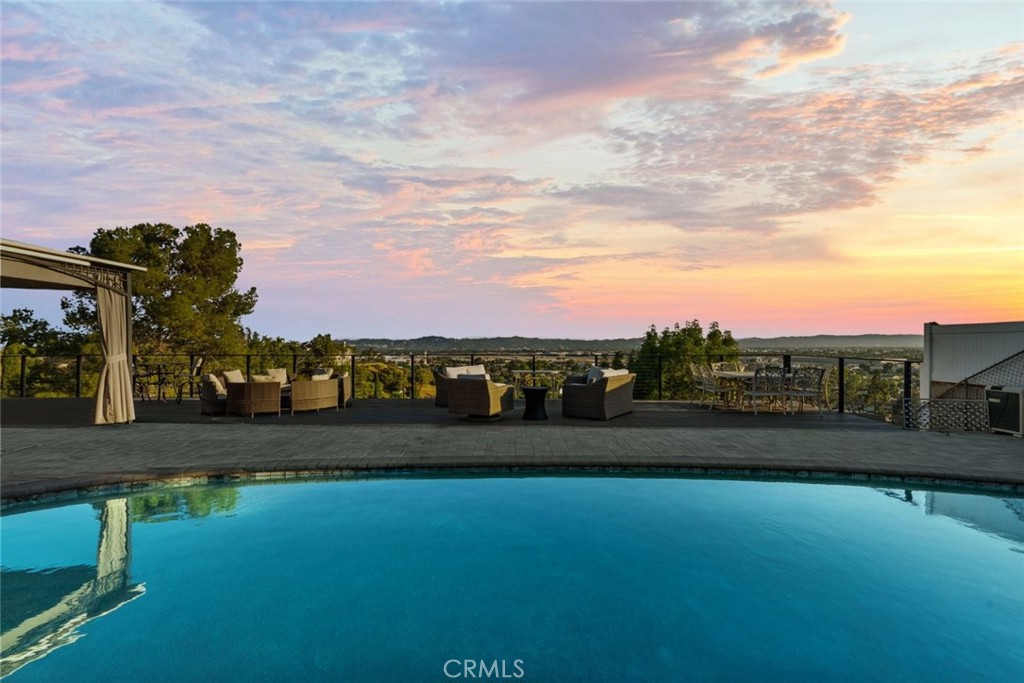 10126 Sully Drive Sun Valley, CA 91352 - Photo 27 of 34 a view of a field with grass and a building in the background