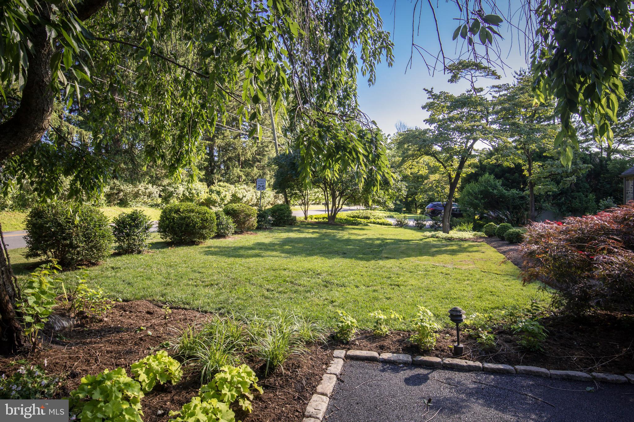 6115 West Mill Road Flourtown, PA 19031 - Photo 36 of 39 Front yard and belgian block edged driveway