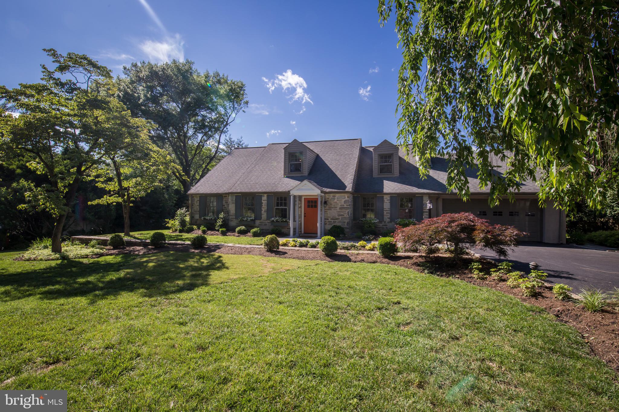 6115 West Mill Road Flourtown, PA 19031 - Photo 37 of 39 Front of house with attached garage and driveway