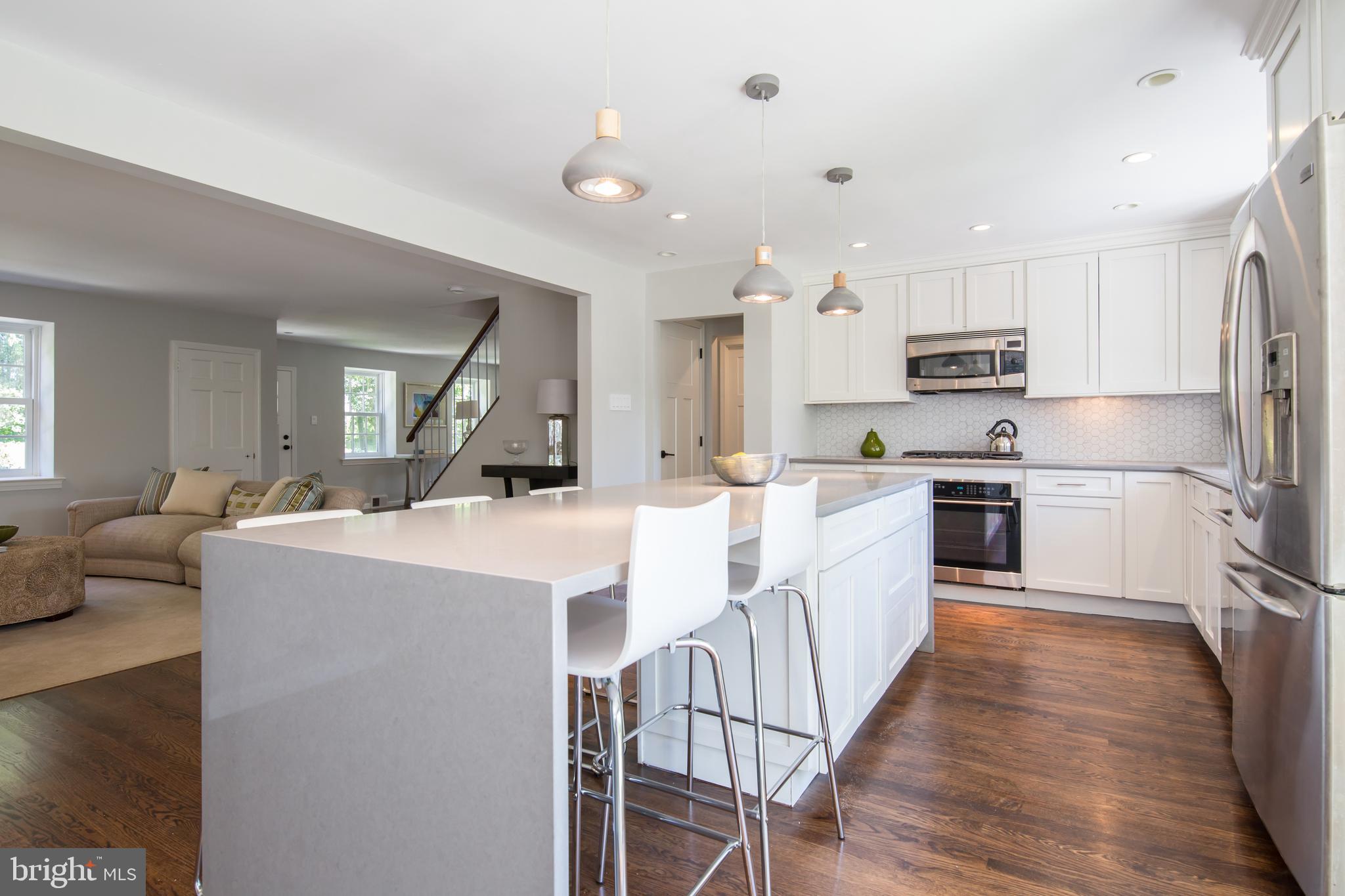 6115 West Mill Road Flourtown, PA 19031 - Photo 6 of 39 Kitchen opens to family room