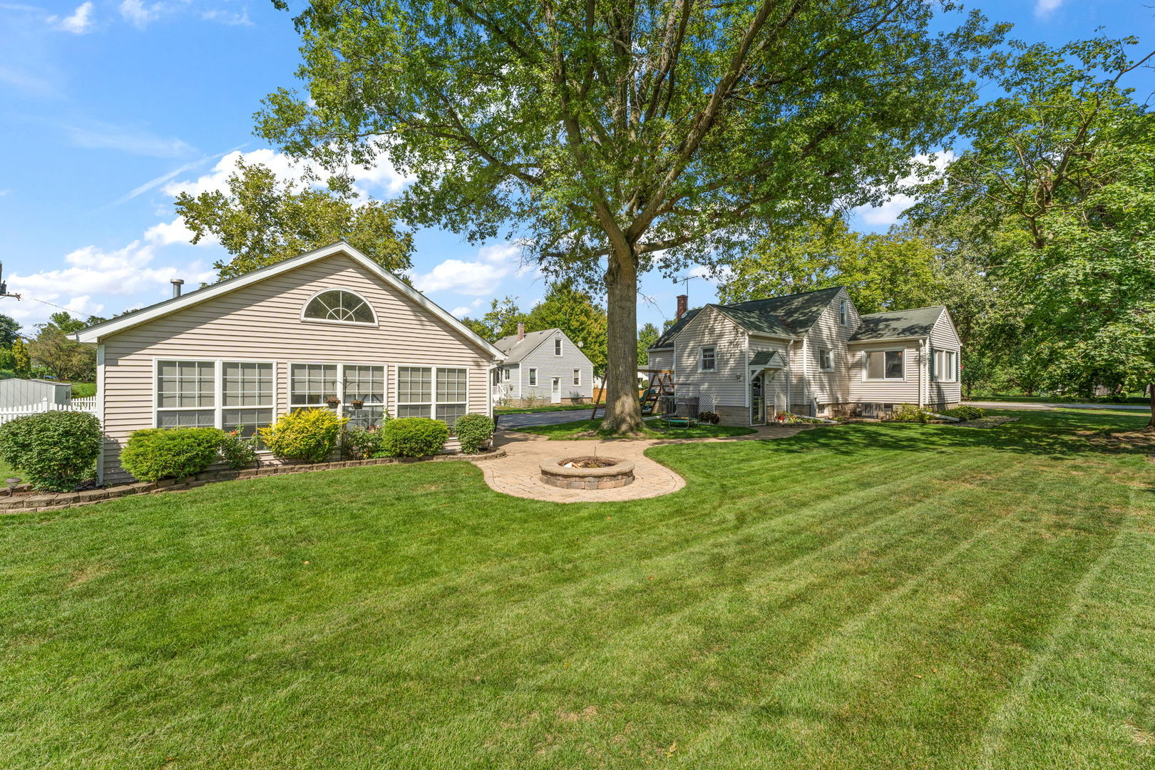 710 Elliott Street Beecher, IL 60401 - Photo 19 of 21 a front view of a house with a yard