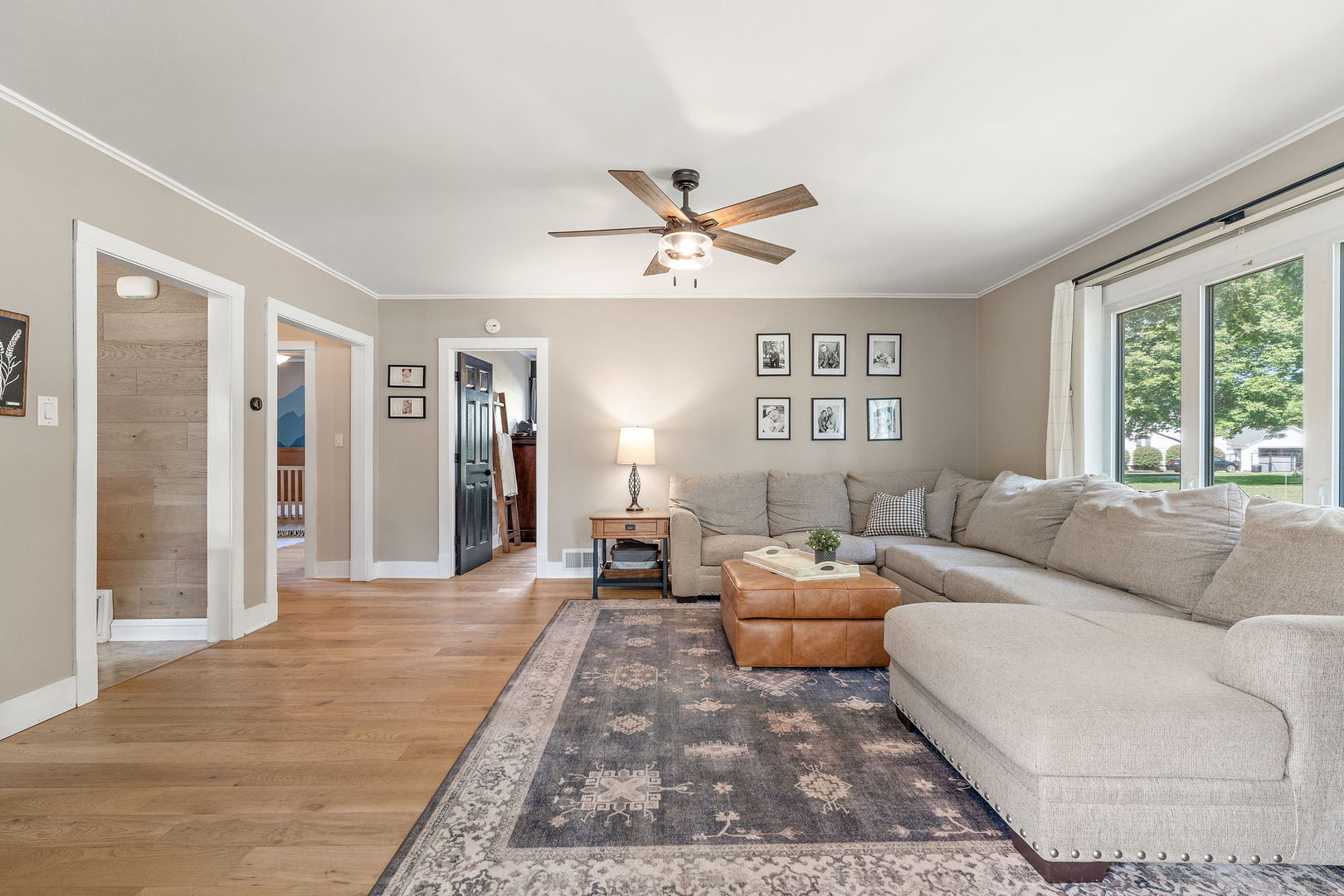 710 Elliott Street Beecher, IL 60401 - Photo 3 of 21 a living room with furniture and a large window