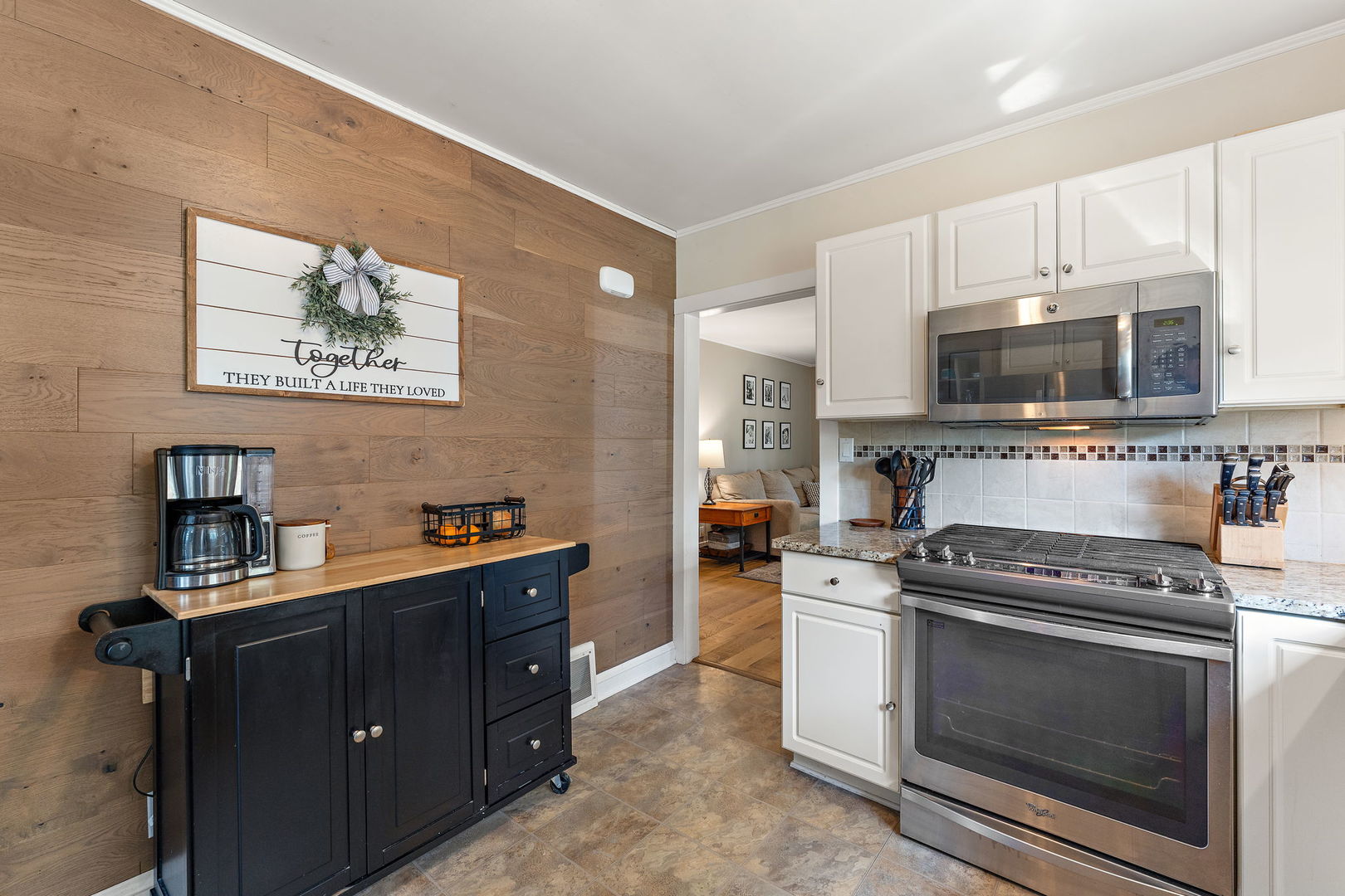 710 Elliott Street Beecher, IL 60401 - Photo 7 of 21 a kitchen with a stove and a microwave