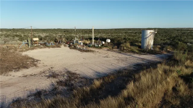 a view of lake with green space