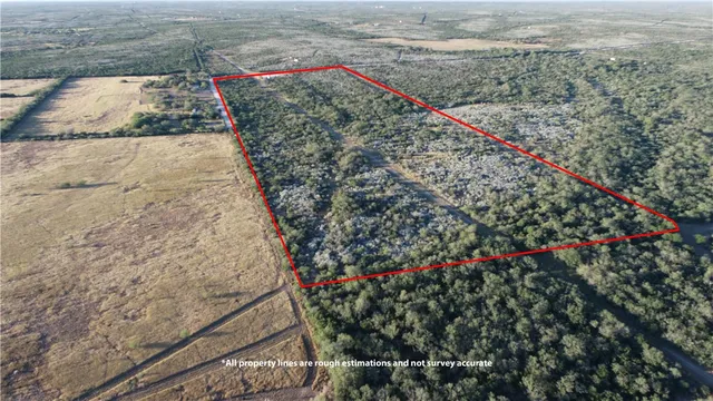 a view of a pathway both side of the house