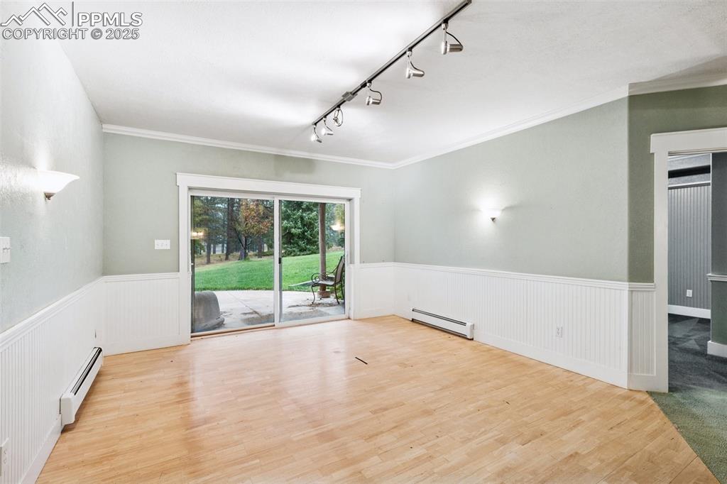 17522 Abert Ridge View Colorado Springs, CO 80908 - Photo 40 of 46 a large white bed in a room next to a window