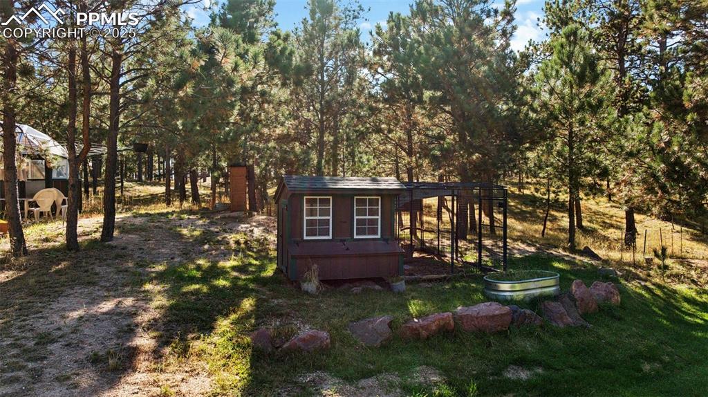 17522 Abert Ridge View Colorado Springs, CO 80908 - Photo 46 of 46 a view of house with yard