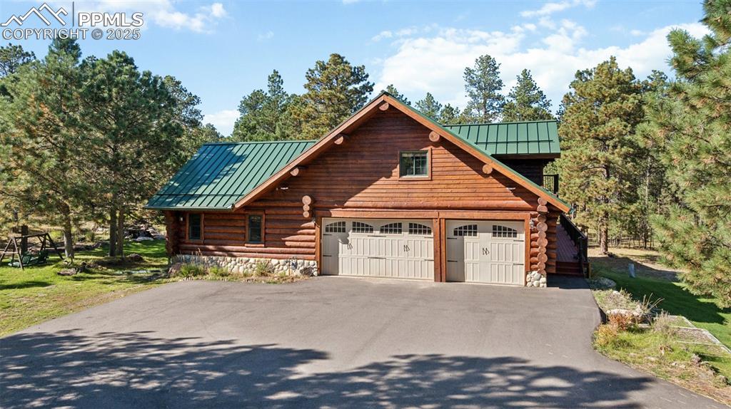 17522 Abert Ridge View Colorado Springs, CO 80908 - Photo 5 of 46 a view of a house with a yard