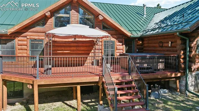 a view of a chairs and tables in the balcony