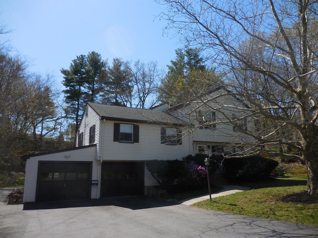 28 Lillian Road Lexington, MA 02420 - Photo 10 of 10 a front view of a house with a yard