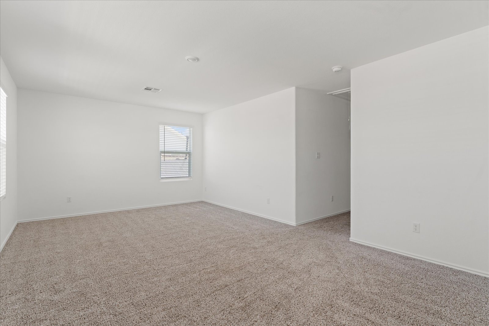 905 Powell Kyle, TX 78640 - Photo 25 of 37 an empty room with windows