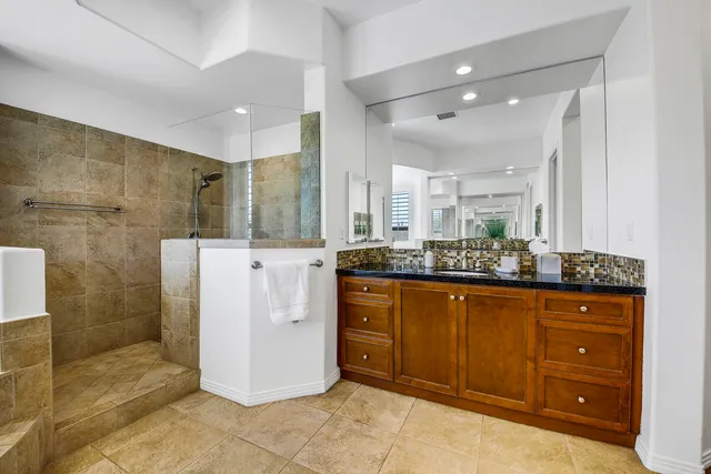 a kitchen with a stove and a refrigerator