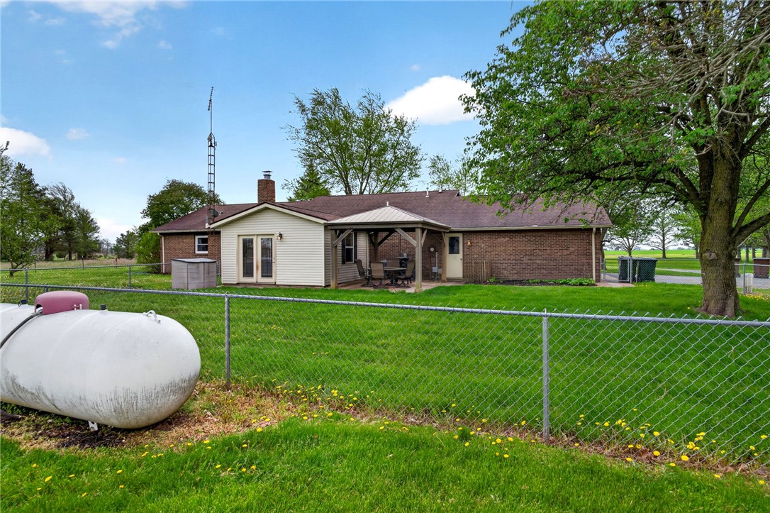 7988 McCool Road Greenville, OH 45331 - Photo 35 of 50 This residence offers a tranquil retreat with a spacious yard and inviting outdoor living.