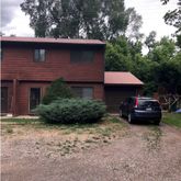 a house view with a garden space