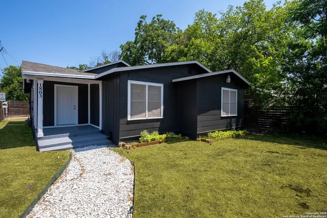 a house view with a garden space