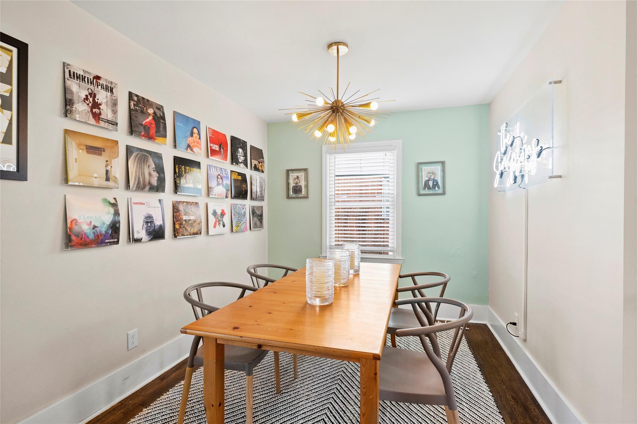 1114 Norland Road Charlotte, NC 28205 - Photo 12 of 36 a view of a dining room with furniture window and wooden floor