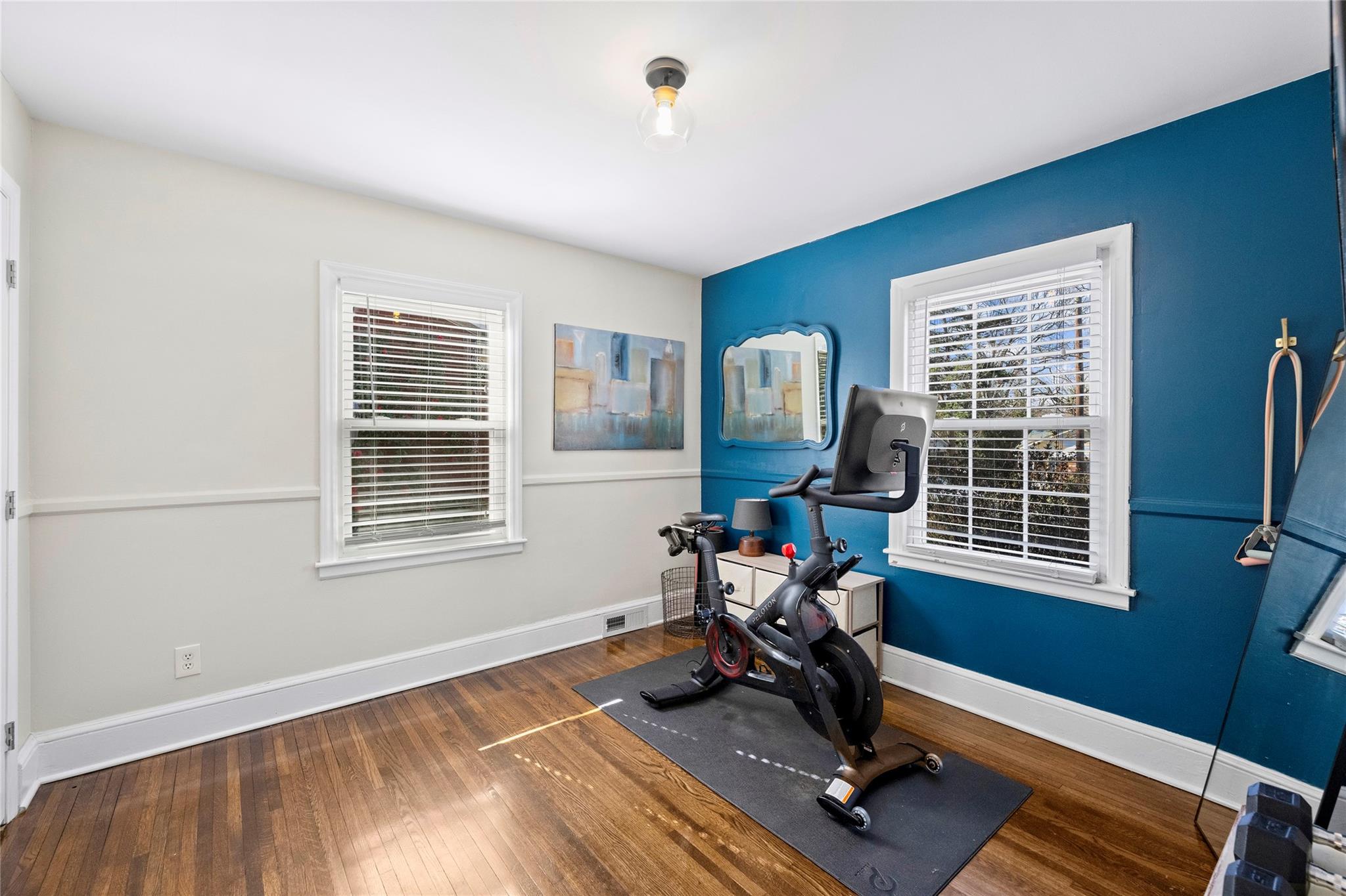 1114 Norland Road Charlotte, NC 28205 - Photo 24 of 36 a view of a workspace with furniture and a window