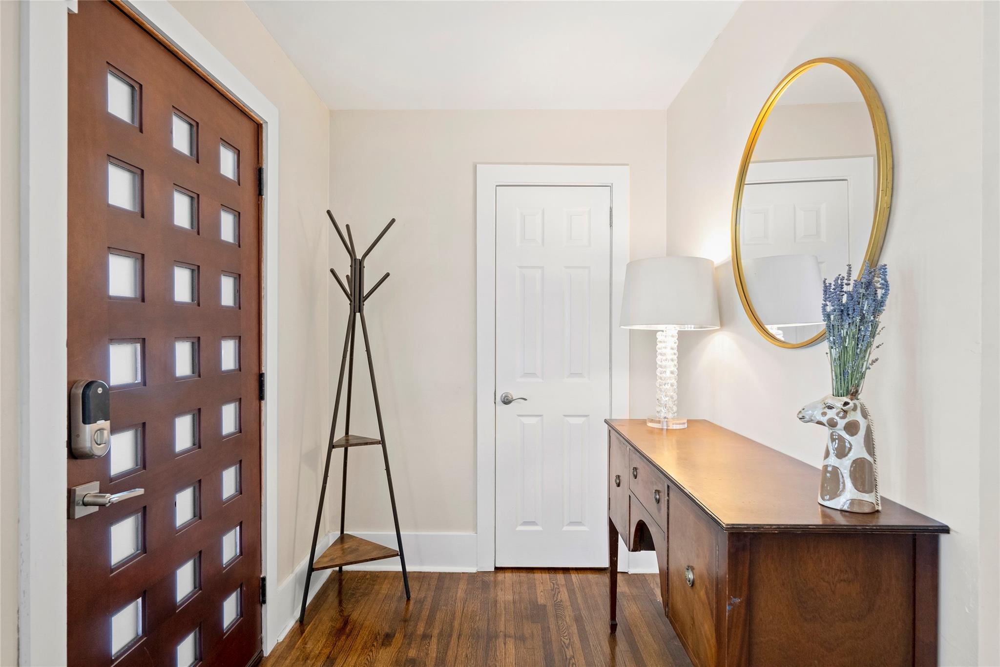 1114 Norland Road Charlotte, NC 28205 - Photo 4 of 36 a room with a table and a mirror