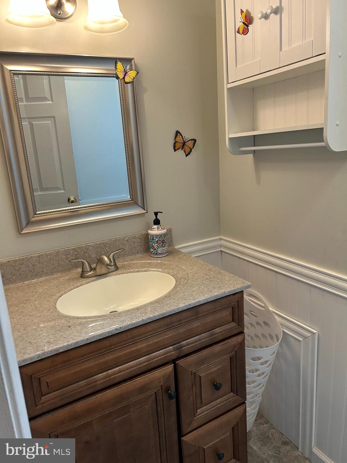 728 Mountain Road Boyertown, PA 19512 - Photo 16 of 26 a bathroom with a sink and a mirror