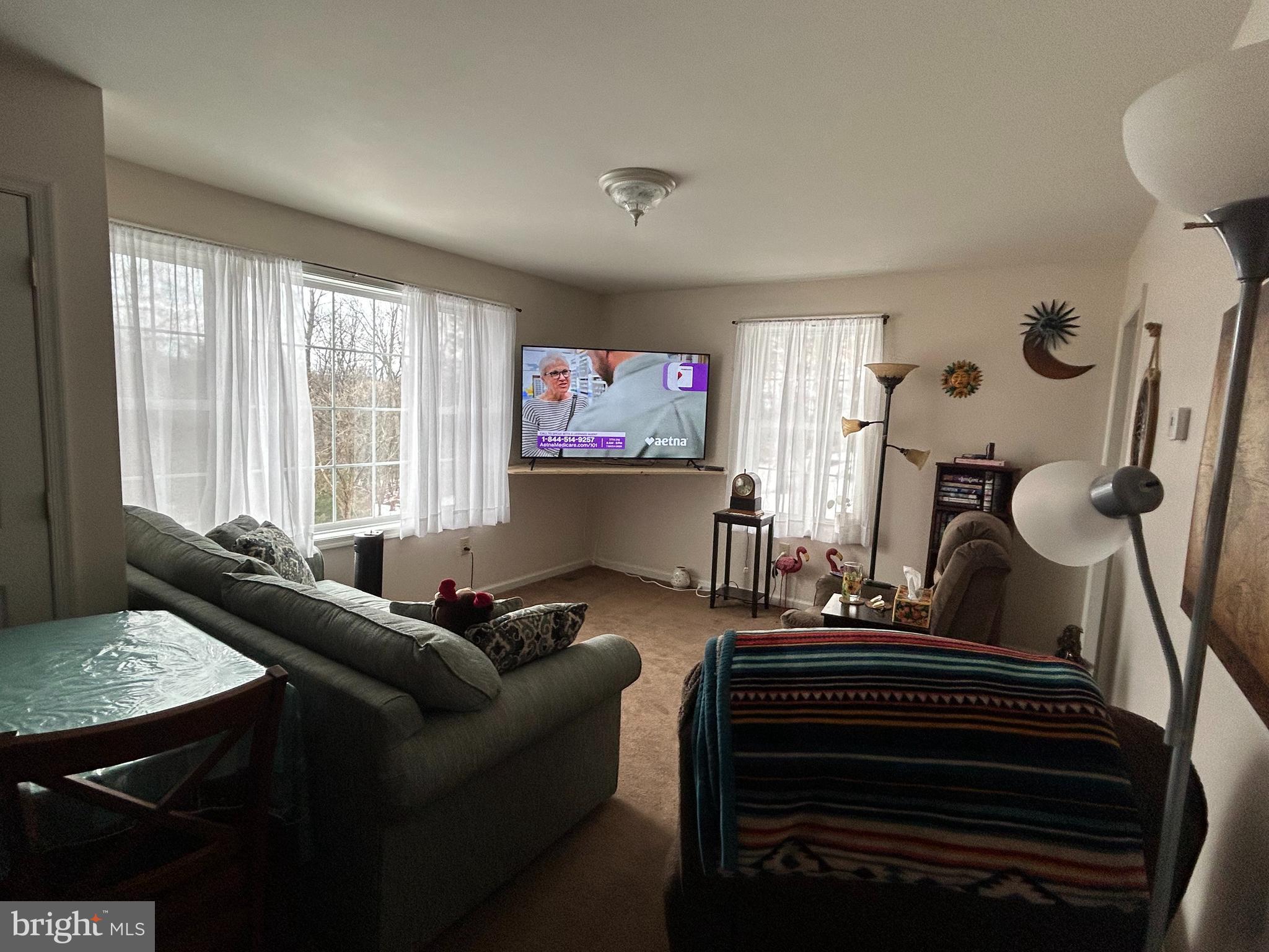 728 Mountain Road Boyertown, PA 19512 - Photo 17 of 26 a living room with furniture and a large window