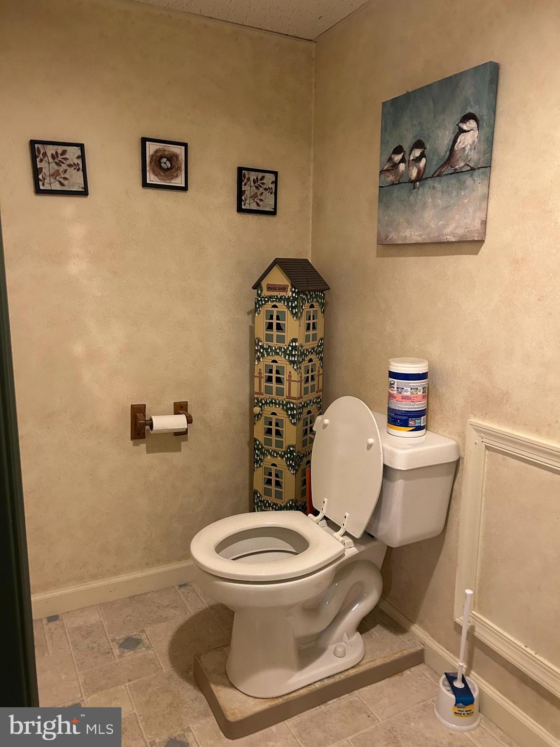 728 Mountain Road Boyertown, PA 19512 - Photo 24 of 26 a bathroom with a toilet a sink and a mirror