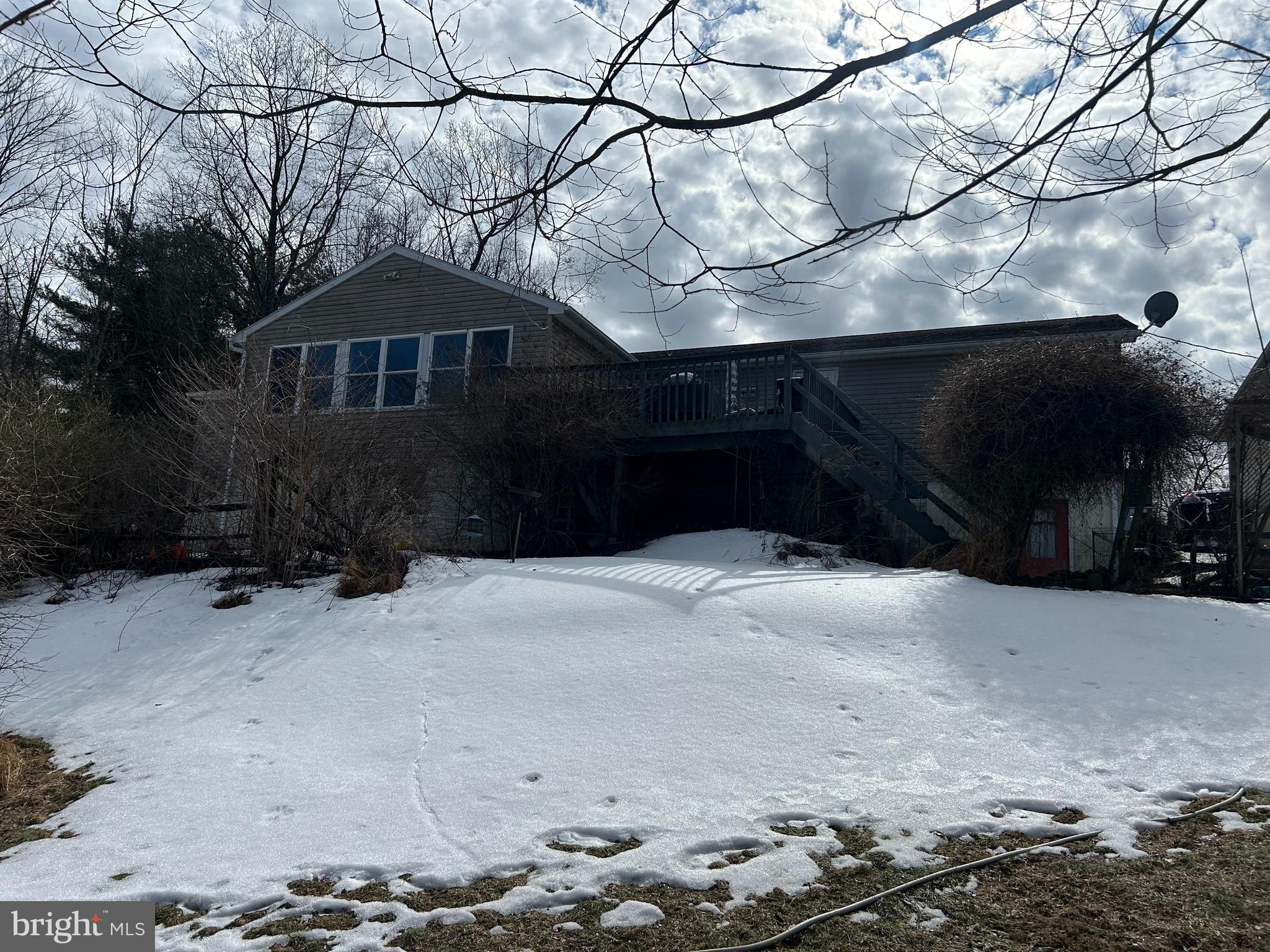 728 Mountain Road Boyertown, PA 19512 - Photo 3 of 26 a front view of a house with a yard