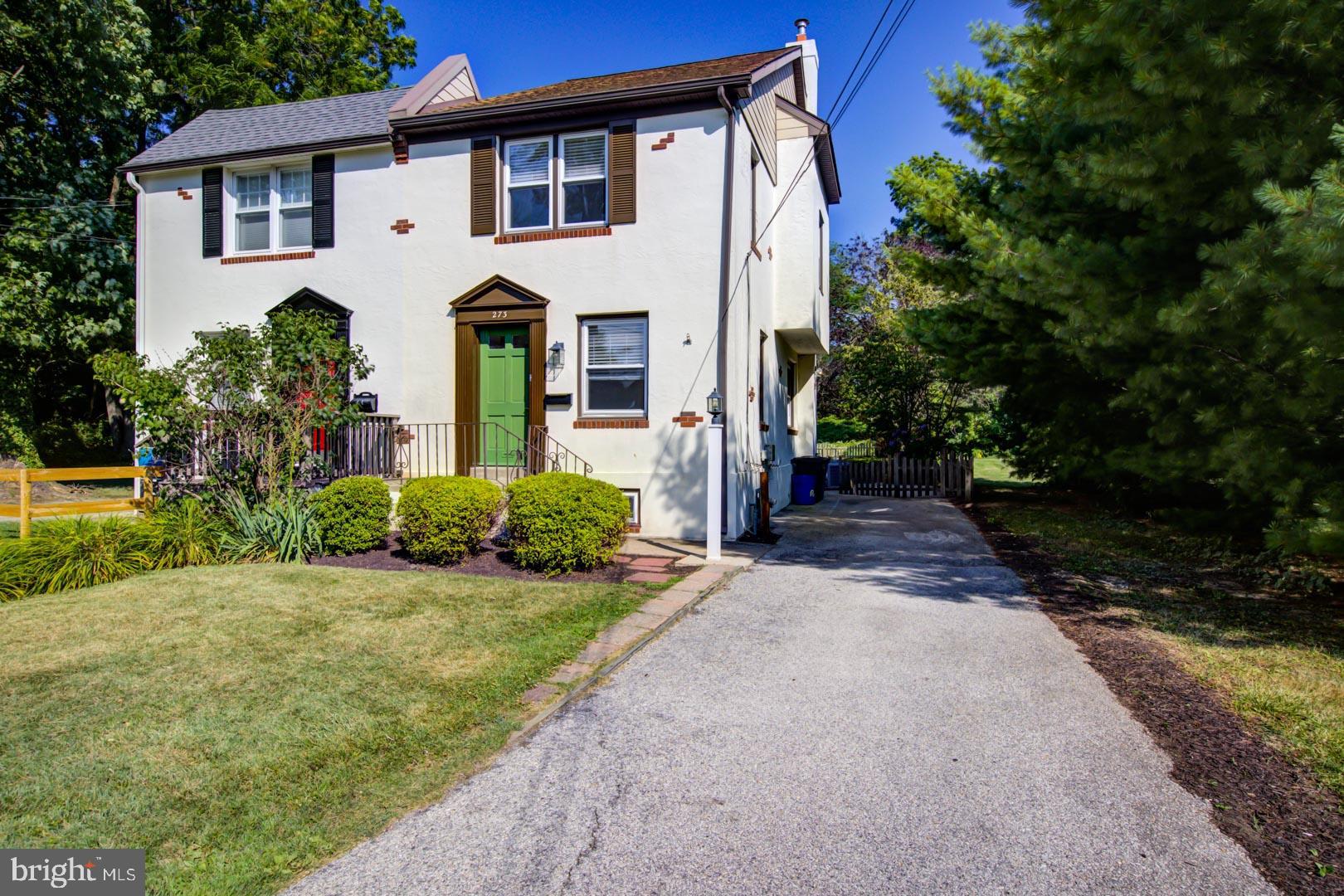273 South Devon Avenue Wayne, PA 19087 - Photo 2 of 32 a front view of a house with garden