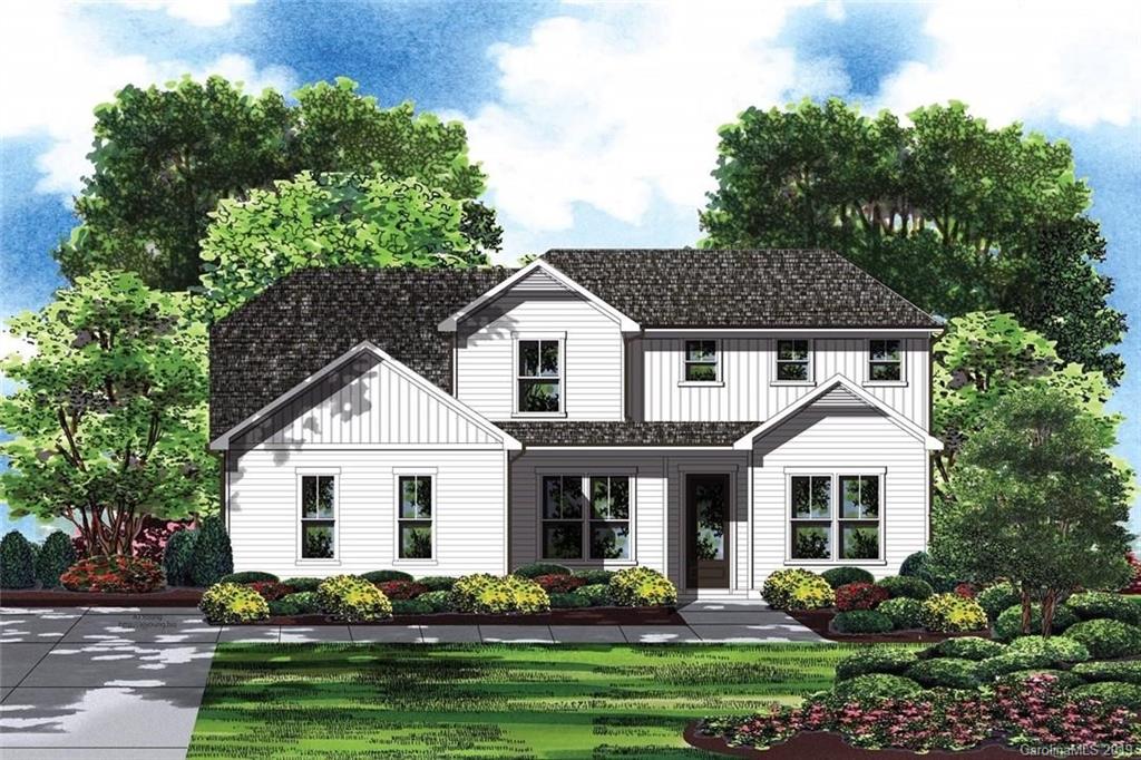 5345 State Rd S-46-557 Clover, SC 29710 - Photo 1 of 5 a front view of a house with a garden and trees