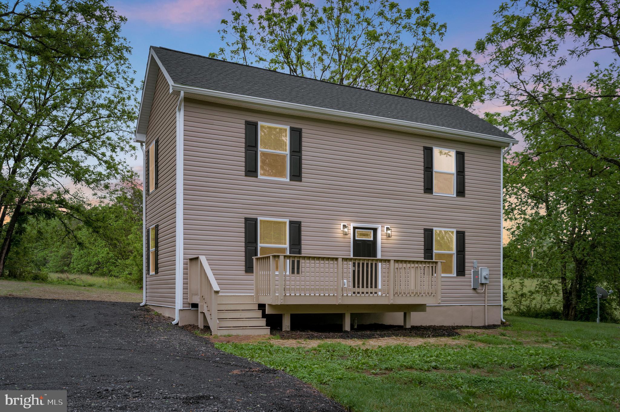 14169 Silver Hill Road Sumerduck, VA 22742 - Photo 35 of 40 a view of front of house with a yard
