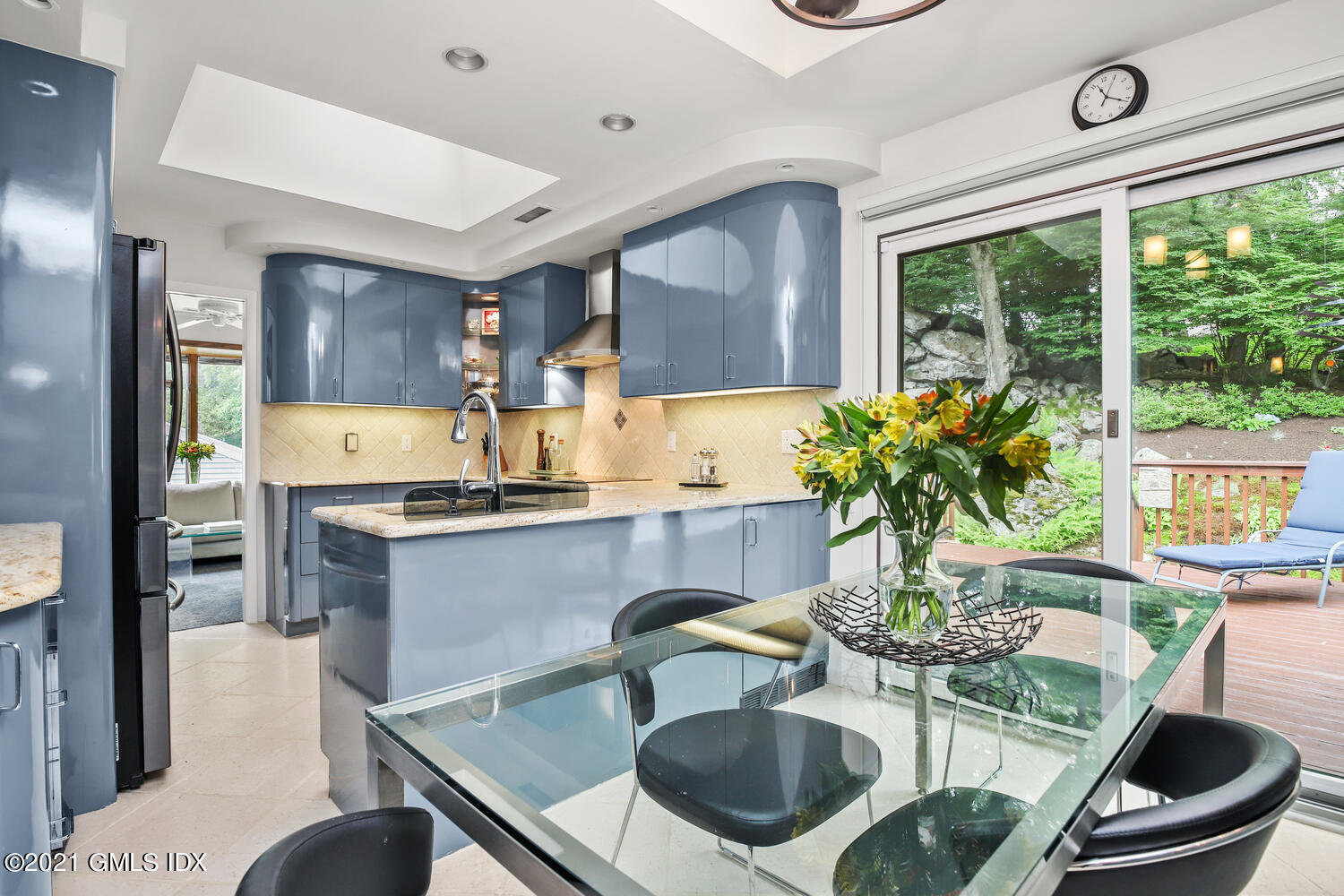 53 Dagmar Road Stamford, CT 06905 - Photo 9 of 36 a kitchen with a table and chairs