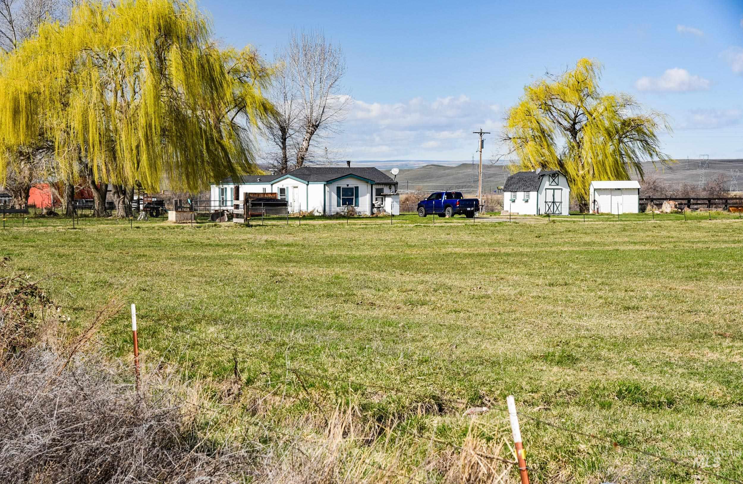 Undisclosed Address Boardman, OR 97818 - Photo 8 of 13 View of yard featuring a storage shed