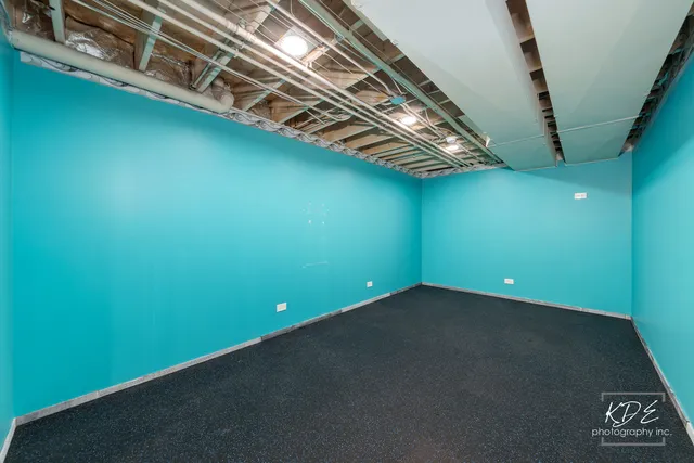 a view of empty room with stairs