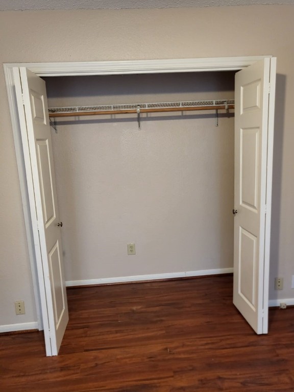 14810 Rancho Vista Drive Houston, TX 77083 - Photo 23 of 33 a view of closet with wooden floor