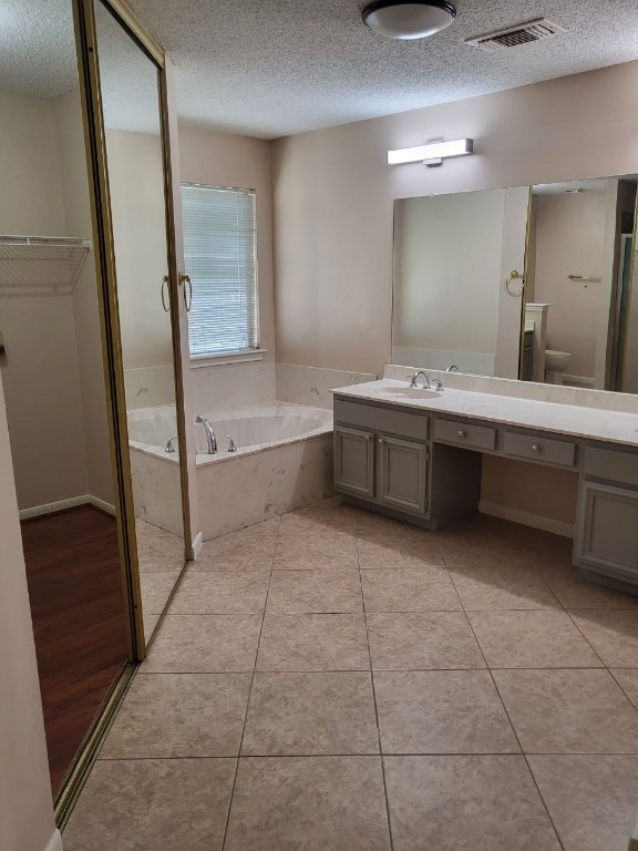 14810 Rancho Vista Drive Houston, TX 77083 - Photo 25 of 33 a bathroom with a bathtub and a sink