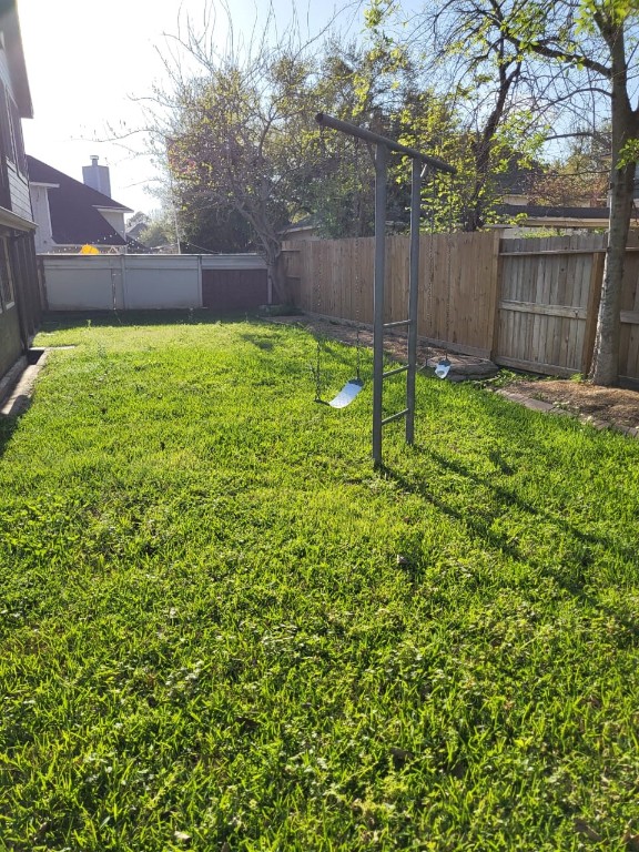 14810 Rancho Vista Drive Houston, TX 77083 - Photo 30 of 33 a view of a backyard with a small cabin and a chair