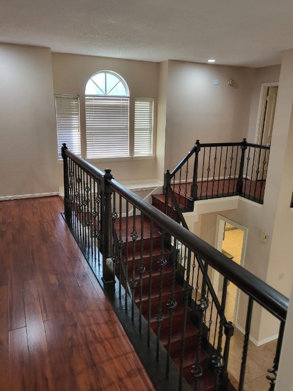 14810 Rancho Vista Drive Houston, TX 77083 - Photo 4 of 33 a view of entryway with wooden floor and stairs