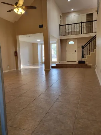 a view of a livingroom with a staircase