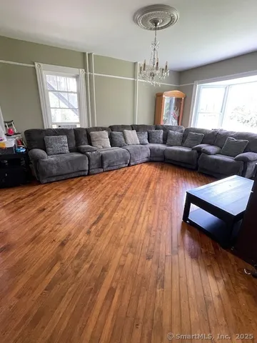 a bedroom with bed and window