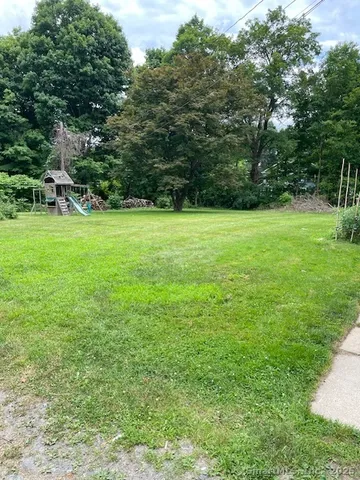 a view of a backyard with a garden
